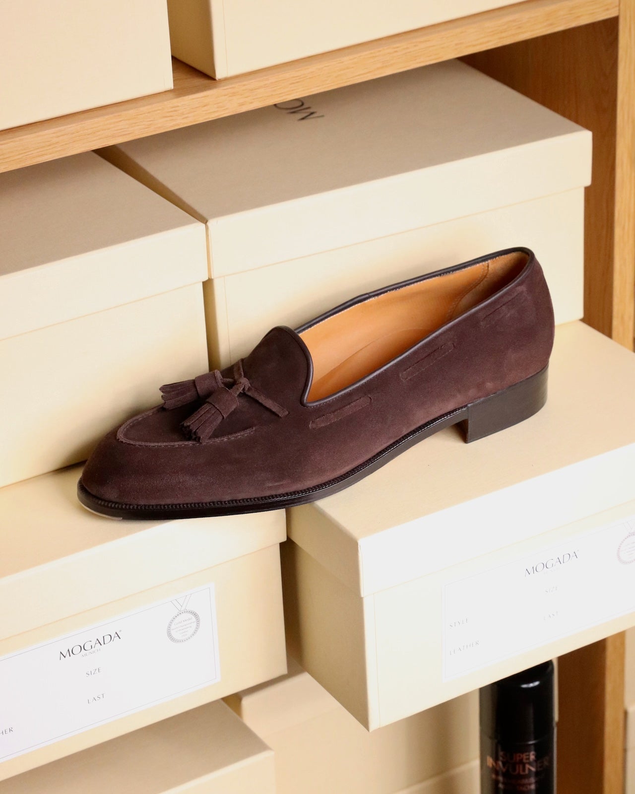 Tasselloafer made from dark brown suede